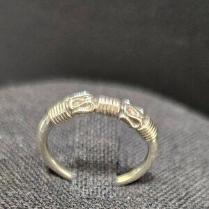 Silver tone ring with scroll / wire wrap design